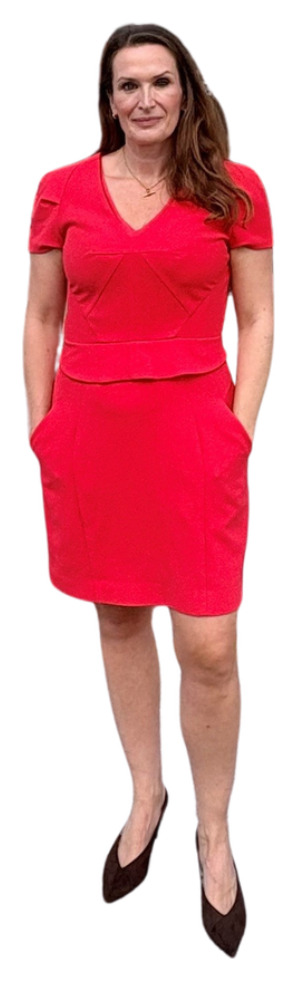 Tessa Parry-Wingfield standing in a red dress